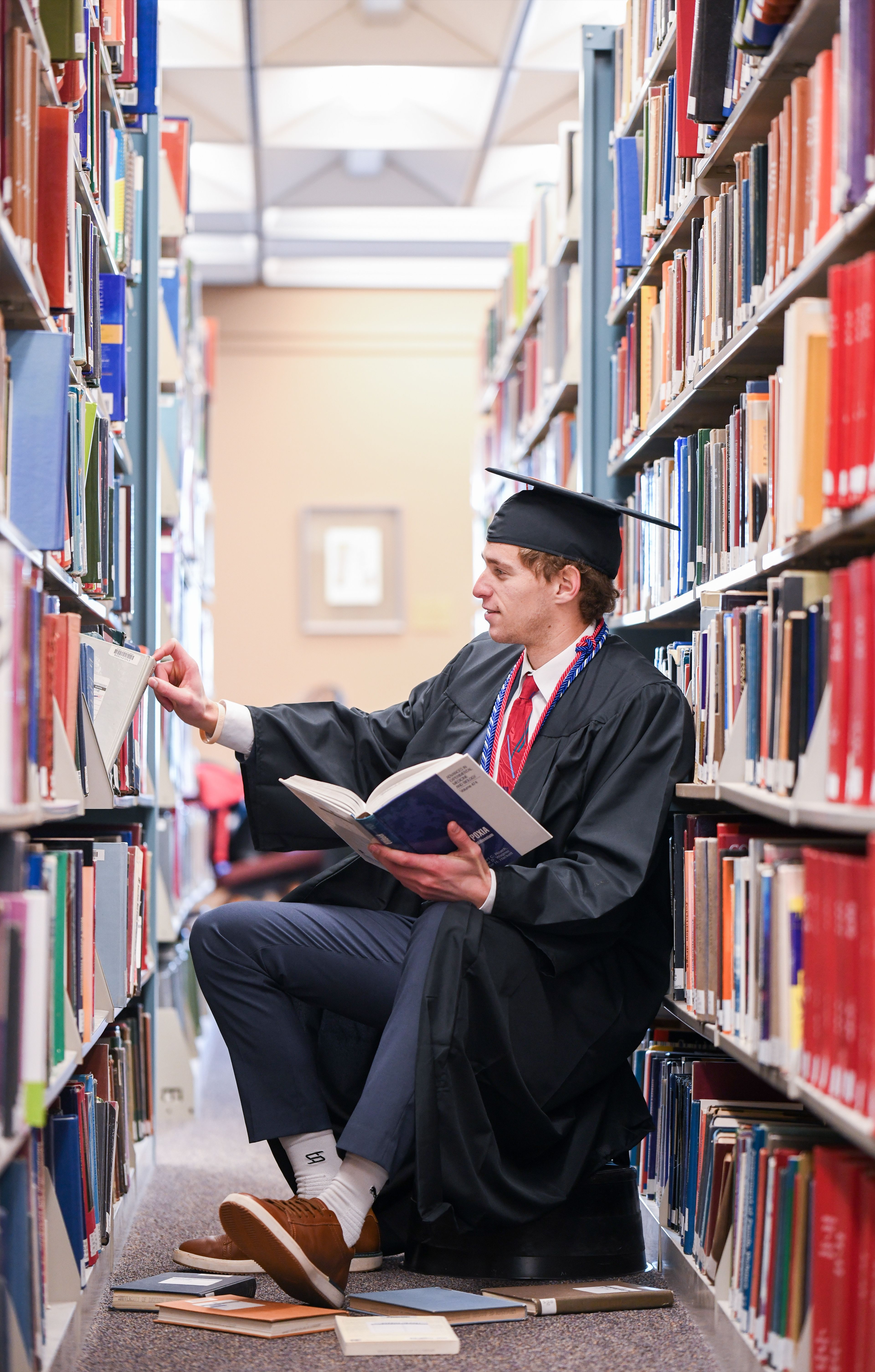 Graduation portrait in library